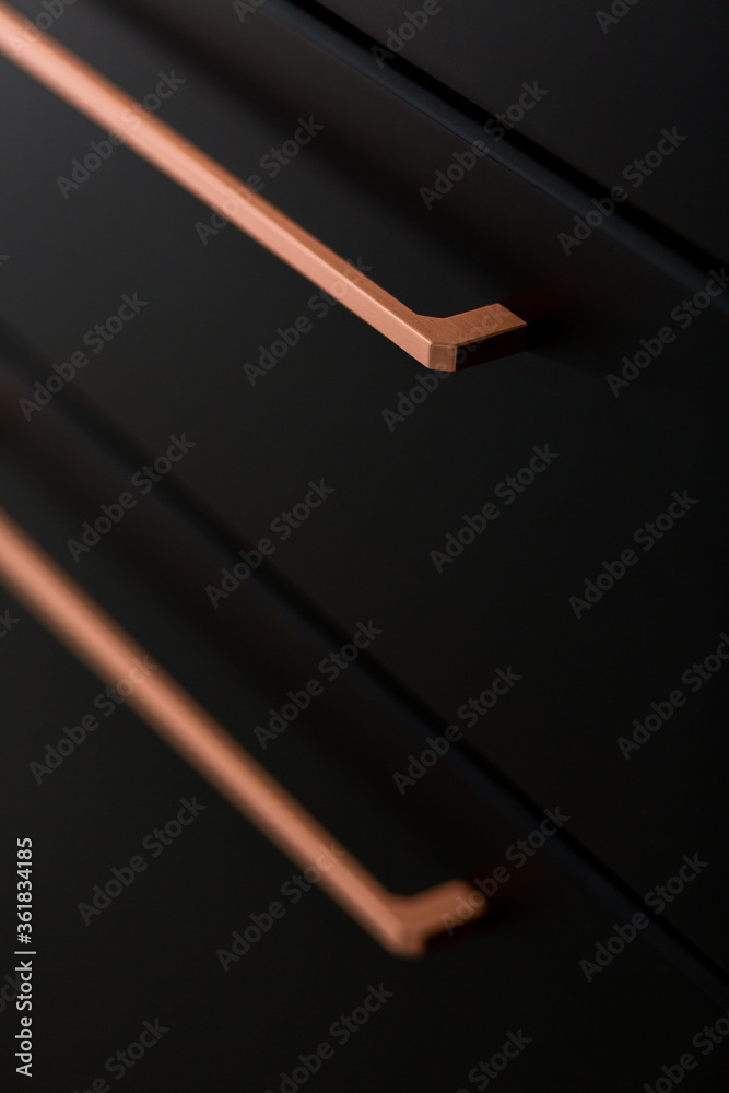 Close-up on copper drawer handle