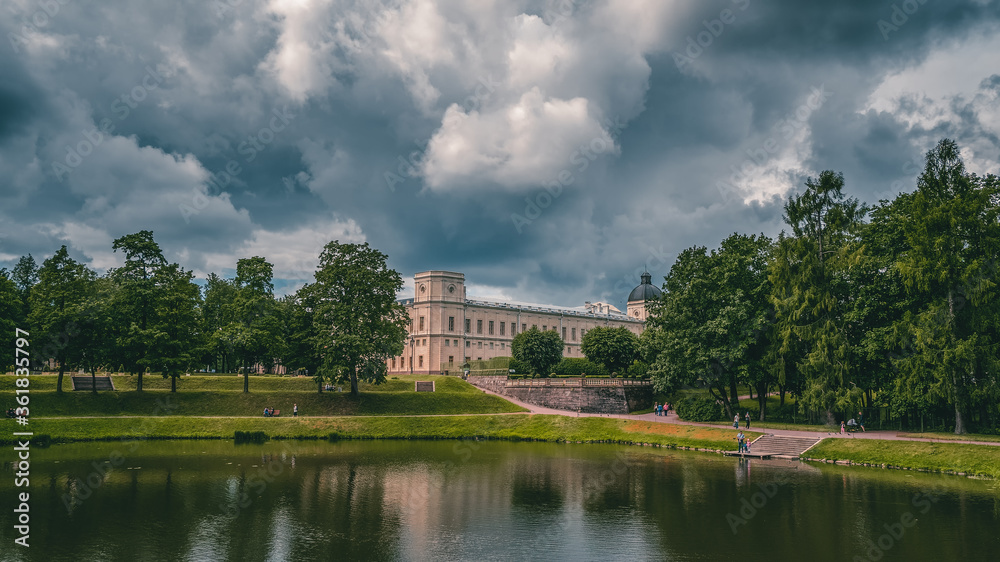 Beautiful panoramic landscape of the Park with a pond and a Great Gatchina Palace. Russia