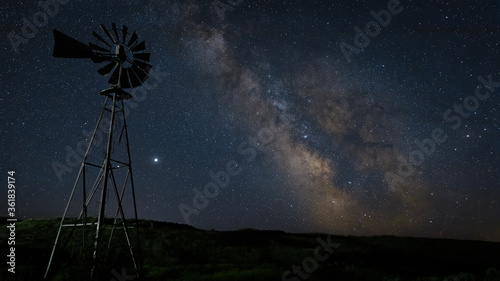starry night sky with windmill