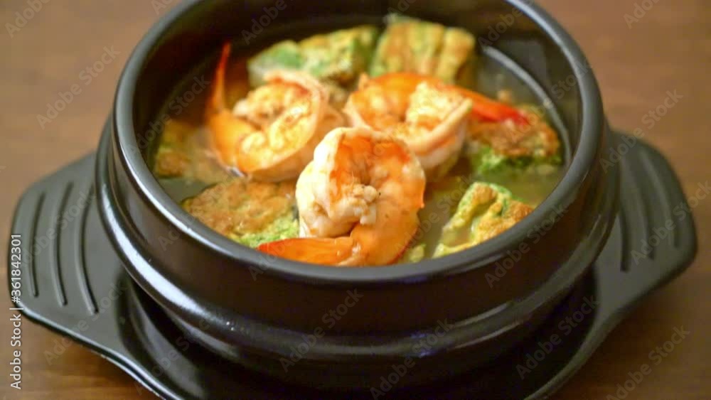 Sour soup made of Tamarind Paste with Shrimps and Vegetable Omelet - Asian food style Sour soup made of Tamarind Paste with Shrimps and Vegetable Omelet - Asian food style