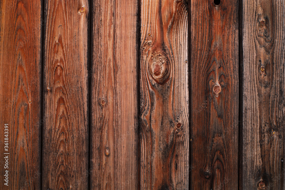 Wood texture. Old grey and orange boards with knots. Wood wallpaper. Wood background Wood texture. Old grey and orange boards with knots. Wood wallpaper. Wood background