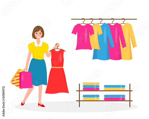 Smiling women with shopping bags and new dress.