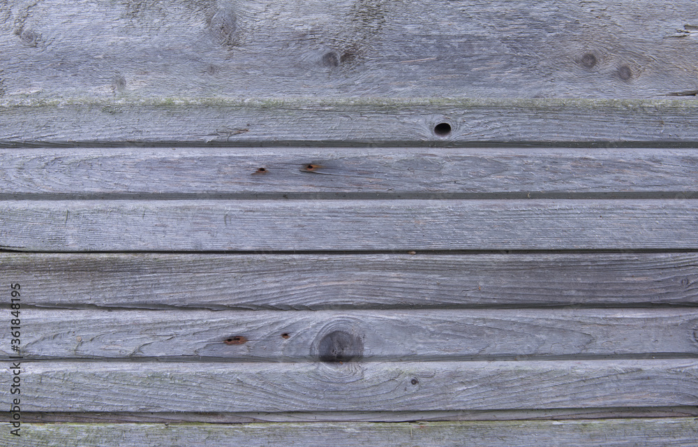 The texture of the old gray cracked Board The texture of the old gray cracked Board