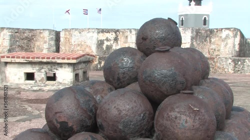 Exploring Castillo San Felipe del Morro in Old San Juan.Pile of cannon balls inside of the fortress. photo