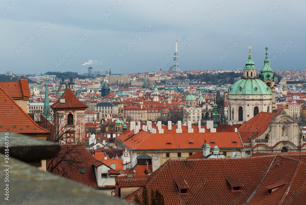 Panorama of Prague, Czech Republic. The view from above on the roofs of houses, the TV tower on the horizon.