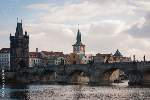 Panorama of the city of Prague, Czech Republic on a sunny day. View of Charles Bridge and the bank of the Vltava River.