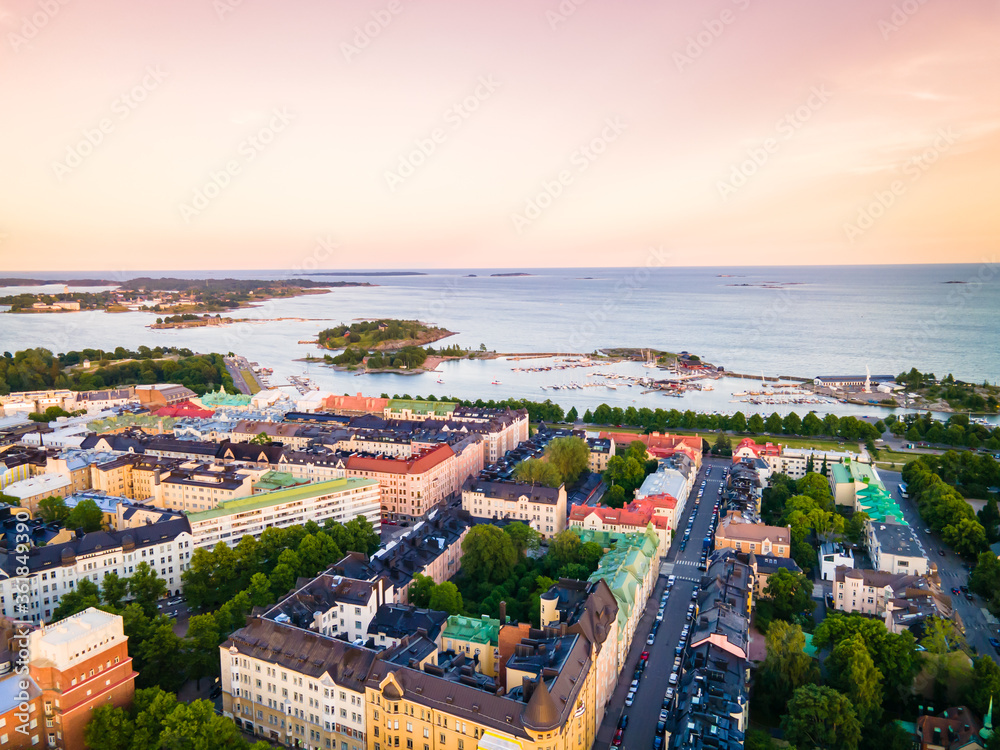 Fototapeta premium Aerial sunset view of beautiful city Helsinki . Colorful sky and colorful buildings. Helsinki, Finland.