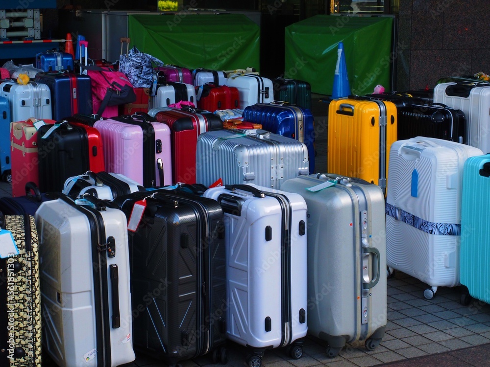 colorful suitcases in hotel lobby