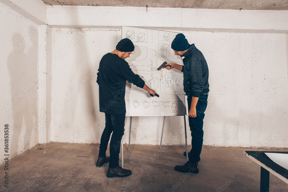 Thiefs making a robbery plan Thiefs making a robbery plan