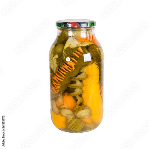 Canned vegetables in a glass jar. Isolated on white background photo