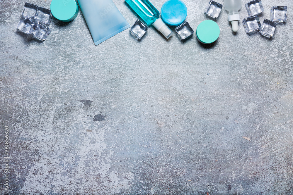 Fototapeta premium Cosmetics on a concrete background