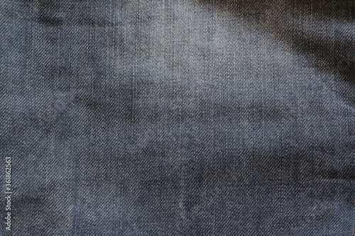 Jeans pattern. View to abstract space of empty dark blue natural clean denim texture for the business background.