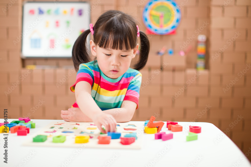 toddler girl learning letter blocks for homeschooling toddler girl learning letter blocks for homeschooling