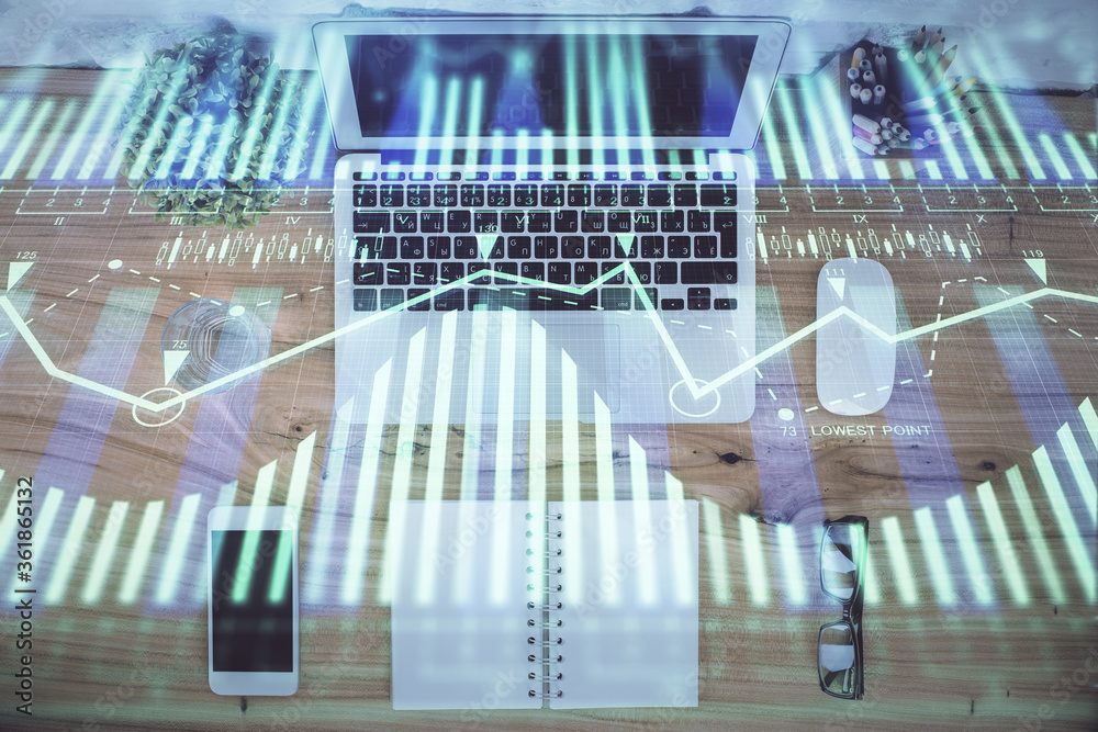 Double exposure of data theme drawing hologram over topview work table background with computer. Concept of technology. Double exposure of data theme drawing hologram over topview work table background with computer. Concept of technology.