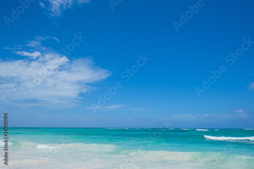 Caribbean sea at noon, white sands.