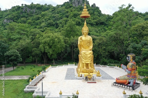 Temple in Ratchaburi Thailand rests at the bottom of the mountain