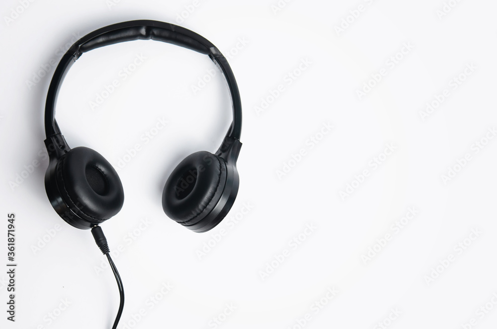 Top view of stereo headphones on a white background. Top view of stereo headphones on a white background.