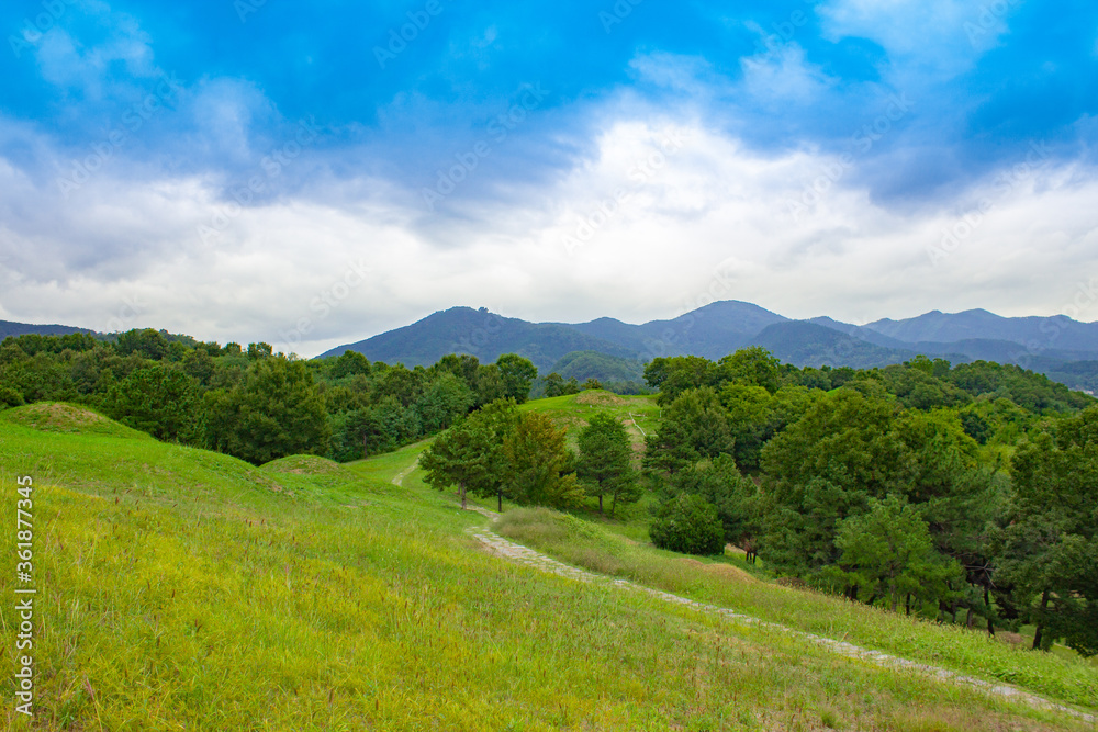 mountain landscape with blue sky and clouds