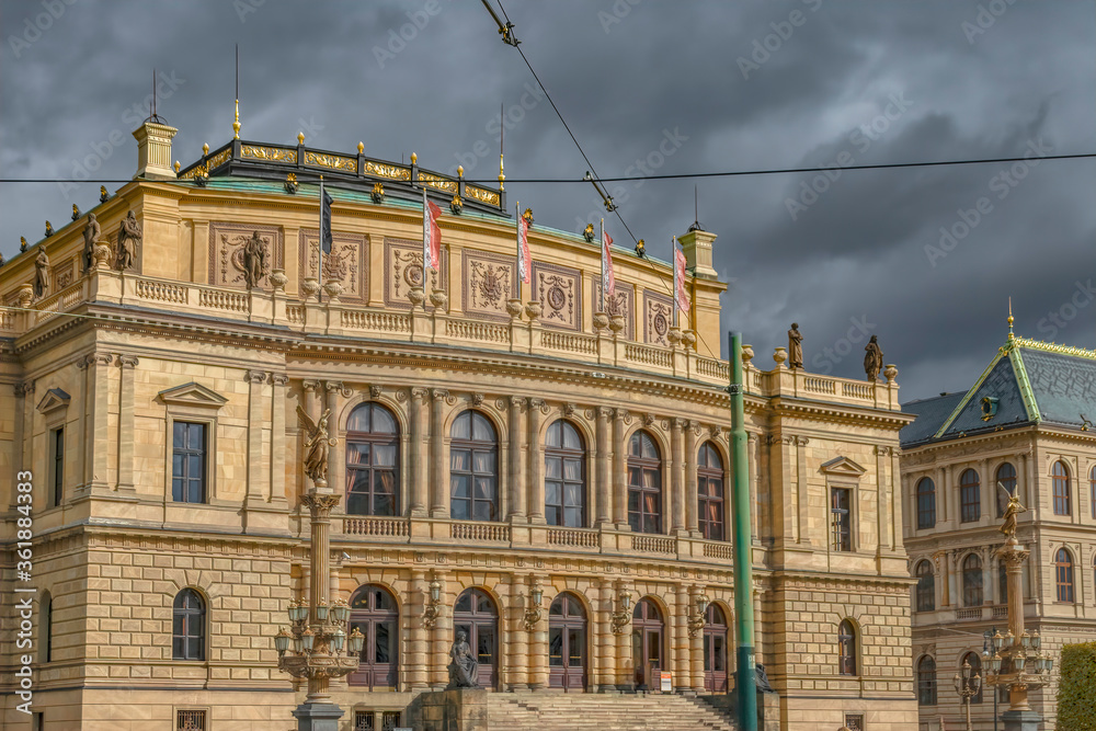 Rudolfium Concert Hall on Prague morning under dark clouds and sky nobody