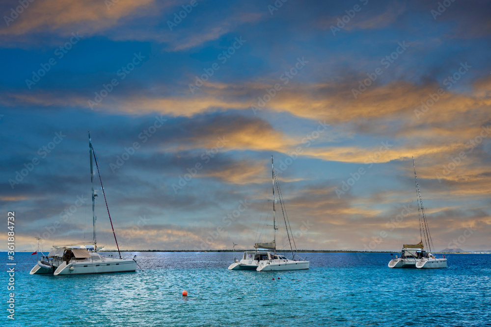 Three White Catamaran Docked in Belize