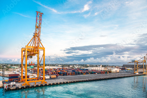 Фотография BRIDGETOWN, BARBADOS - November 22, 2016: Freighters now carry most of the world's cargo and the largest container ships can carry over 21,000 units of freight