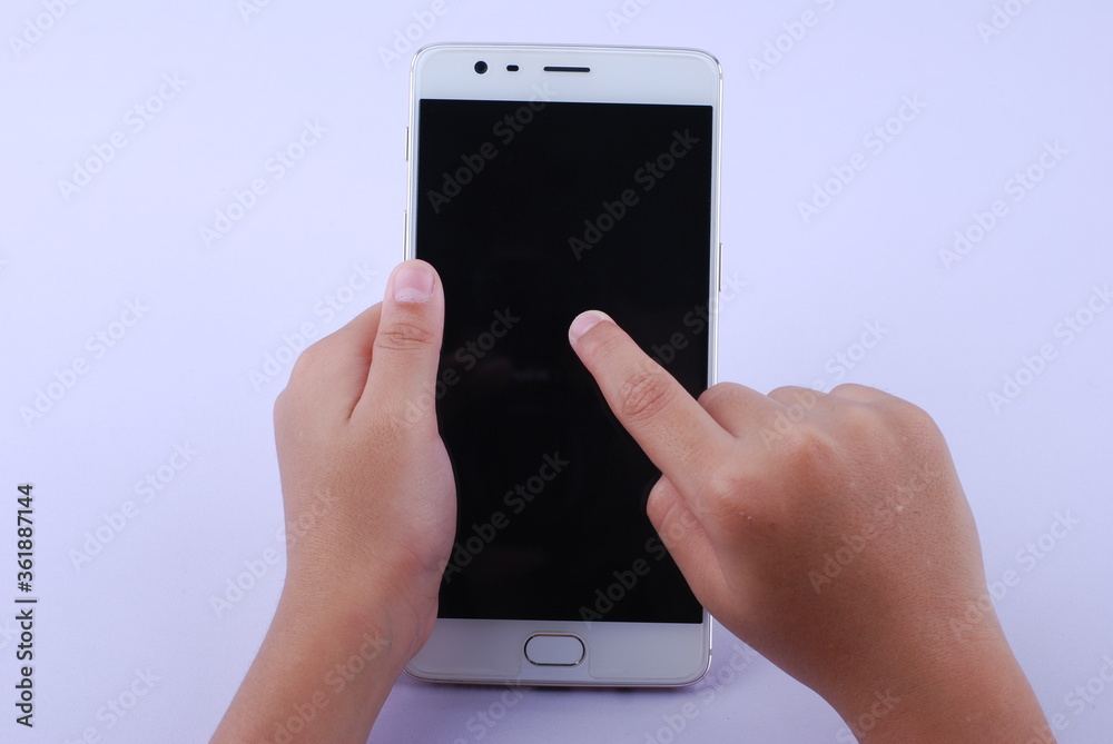 Man hand holding modern smartphone mobile with black screen on isolated white background Man hand holding modern smartphone mobile with black screen on isolated white background