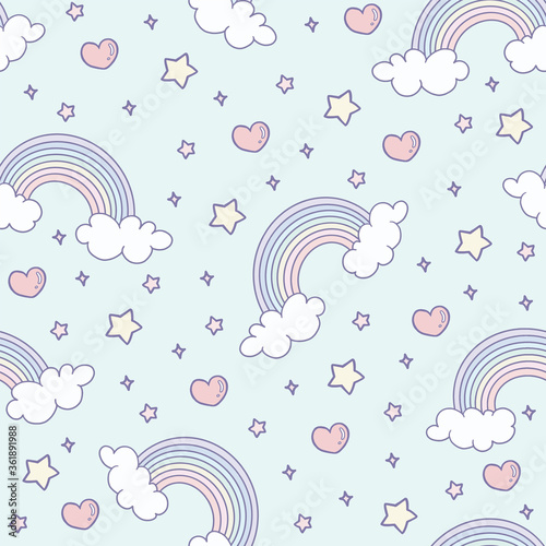 Cute rainbow with clouds and hearts on a light blue background seamless patter.