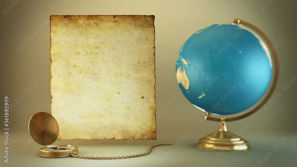 Old objects - globe, compass and vintage paper for inscriptions and headings