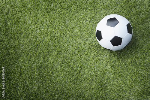 A soccer ball on playing field © ImageHit