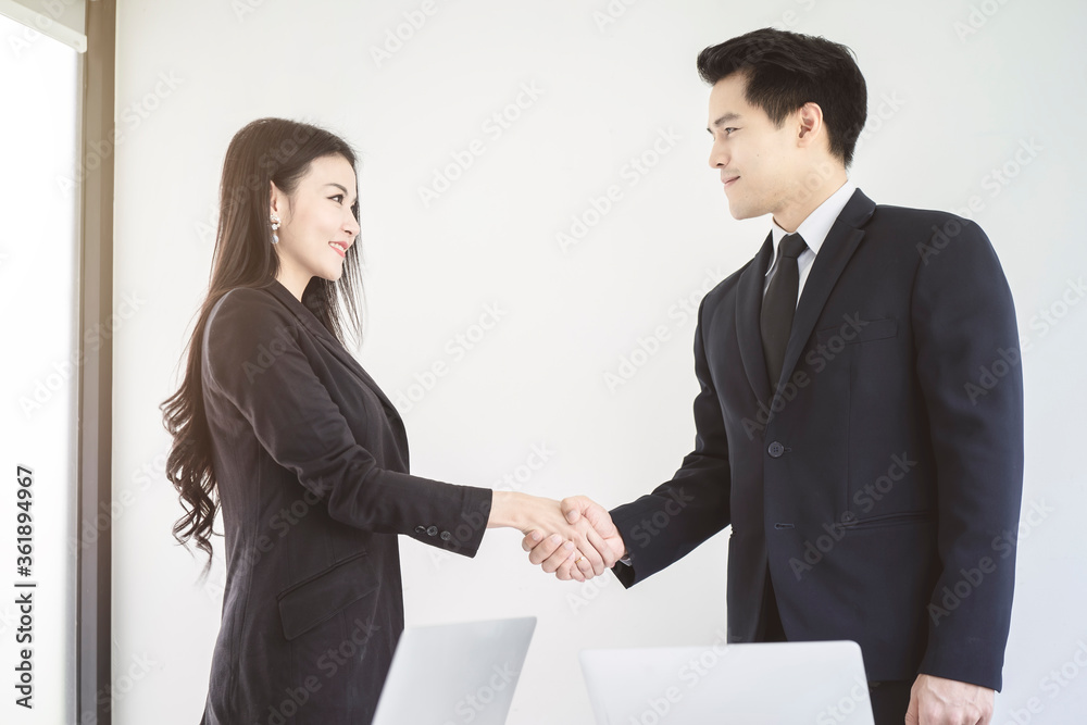 Business people shaking hands to start up business at the office. Success teamwork, partnership and handshake business concept