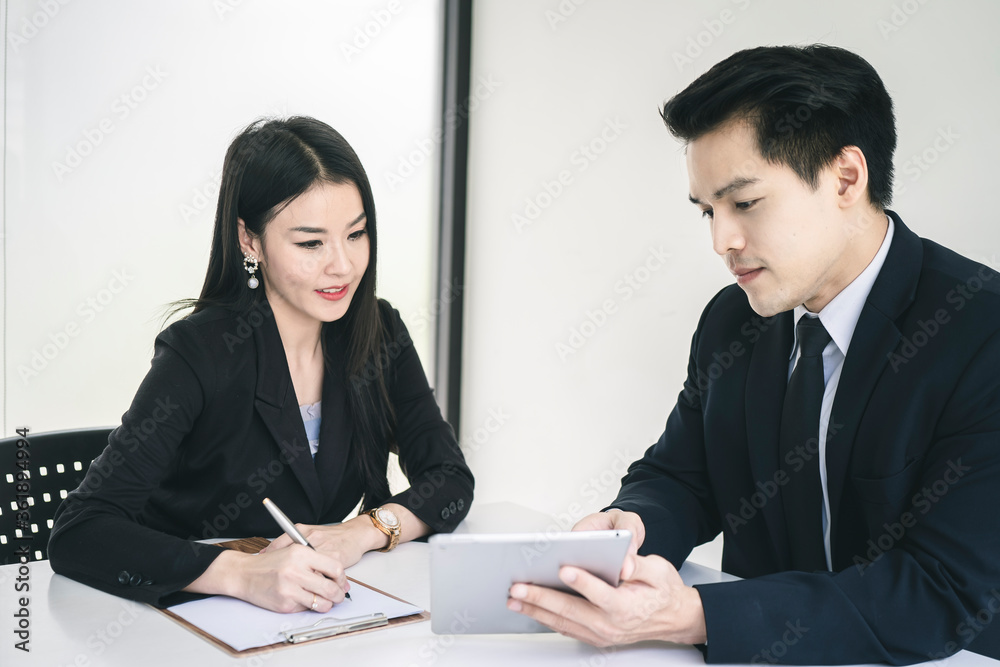 Corporate business team discussing together in conference room during meeting at office. Teamwork and ideas or brainstorming meeting workplace concept. Corporate business team discussing together in conference room during meeting at office. Teamwork and ideas or brainstorming meeting workplace concept.