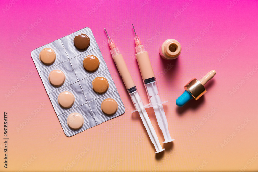 Concealer and liquid foundation skin treatment concept