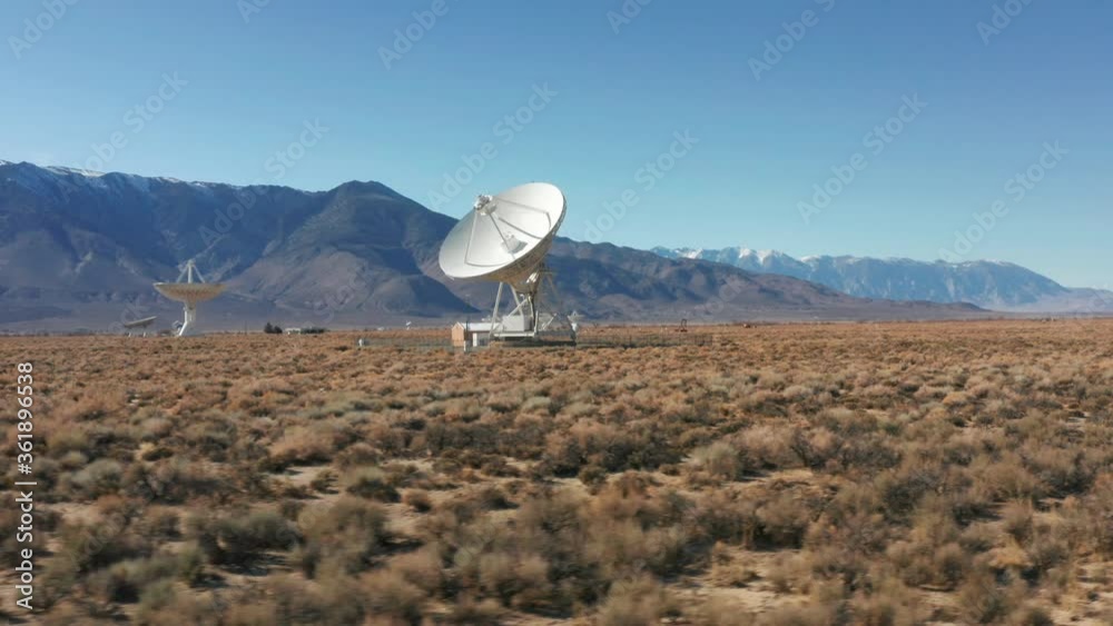 Large radio telescope searches information from the universe. A satellite dish moves and sends a signal into space, out of Earth. California, USA. 4K drone science and innovative technologies footage Large radio telescope searches information from the universe. A satellite dish moves and sends a signal into space, out of Earth. California, USA. 4K drone science and innovative technologies footage