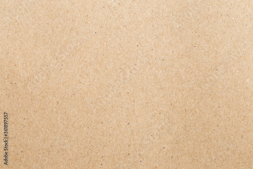 Brown paper background. Empty cardboard texture. Craft sheet