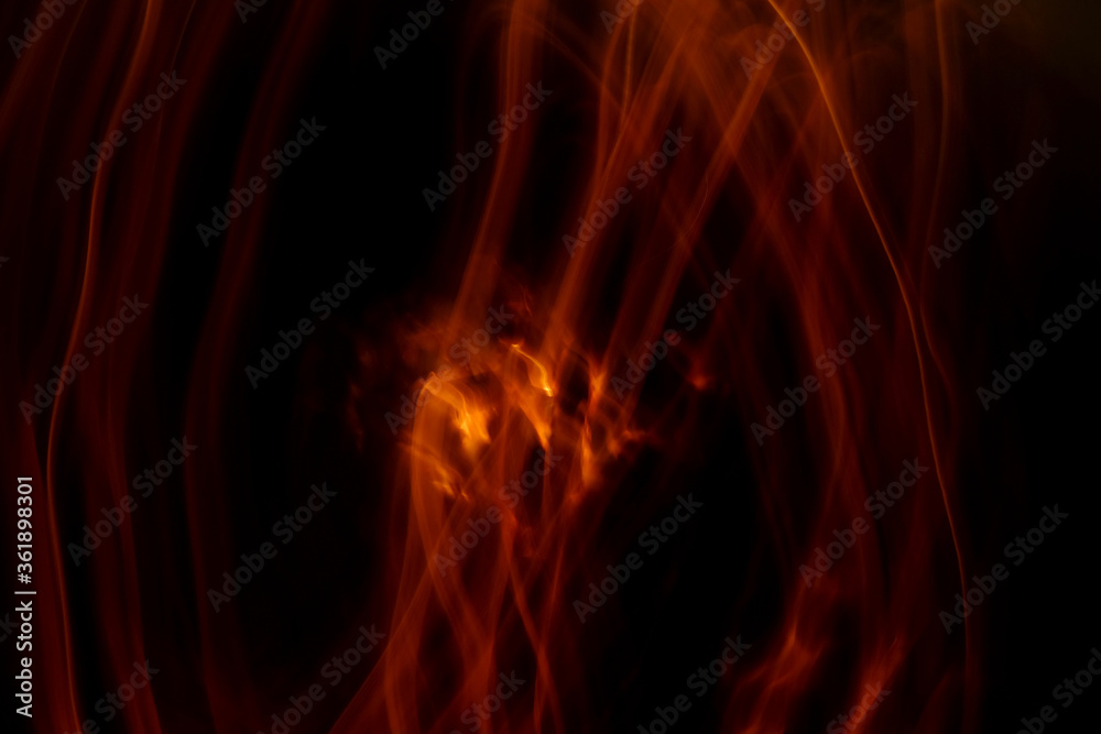 Light abstract, empty Charcoal grill with open fire light at night Light abstract, empty Charcoal grill with open fire light at night