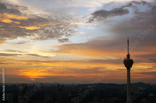 Skyline of KL tower and skyscrapers during sunset 
