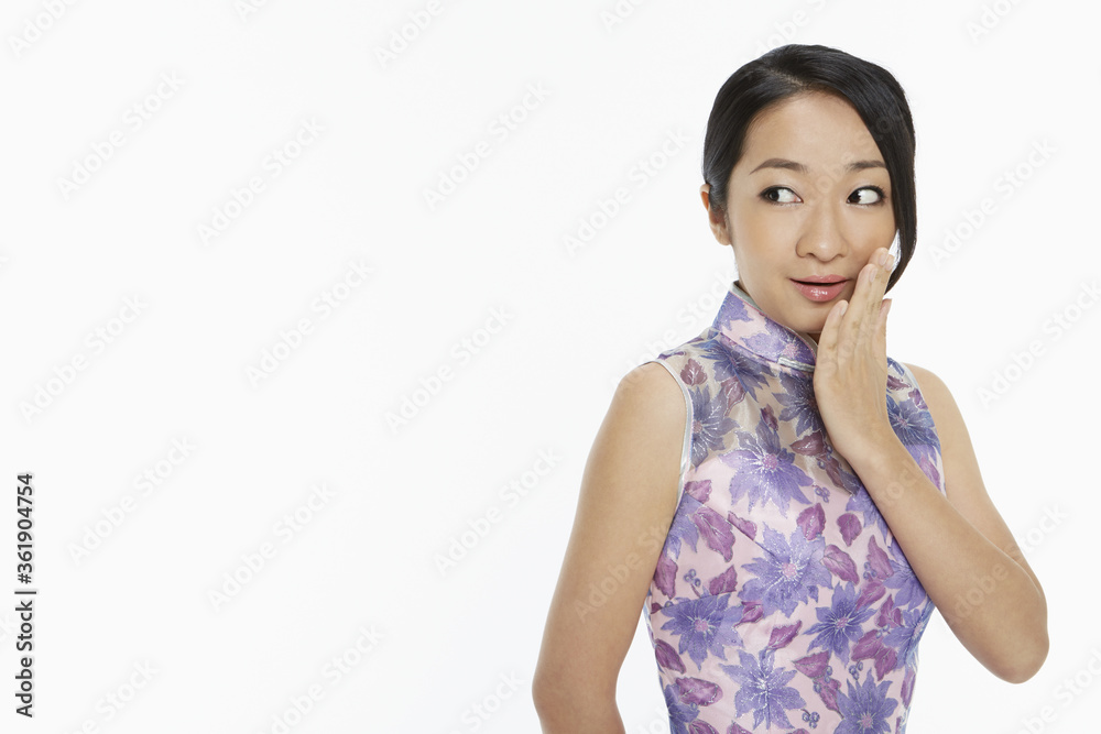 Woman in traditional clothing with a surprised facial expression Woman in traditional clothing with a surprised facial expression