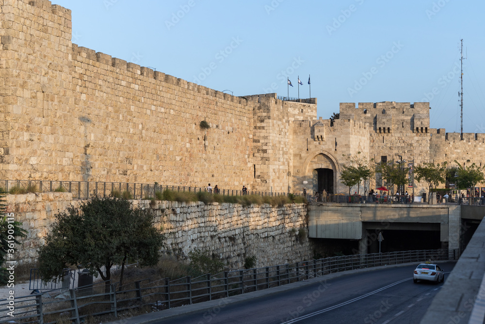 View in the light of the sunset on the walls of the old city near the Jaffa Gate in Jerusalem, Israel