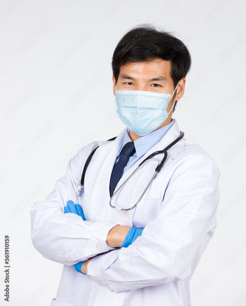 Doctor standing arm crossed on white background. Doctor standing arm crossed on white background.