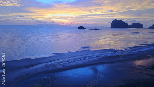 An unspoilt beach of Pak meng, Sikao District, Trang Province, Thailand. A natural beauty of crystal clear sea water, white sandy beach and distant islands located at Southern Thailand photo