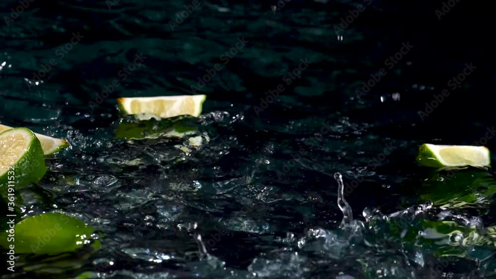 Slice Lime Falling Into Water Slice Lime Falling Into Water
