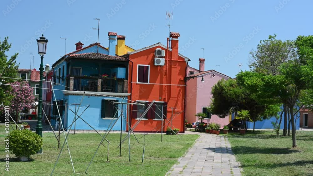 Burano, Venice - Colorful buildings between the canals of the lagoon city Burano, Venice - Colorful buildings between the canals of the lagoon city