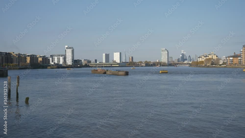 A panning shot of the Thames river in Central London. A panning shot of the Thames river in Central London.