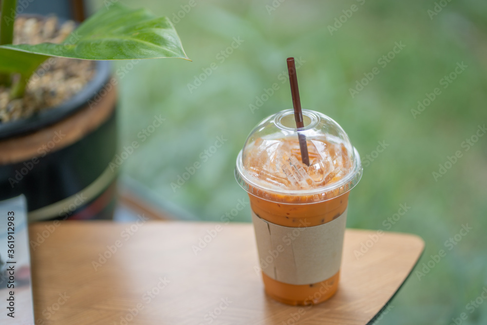 Cold milk tea in the cafe