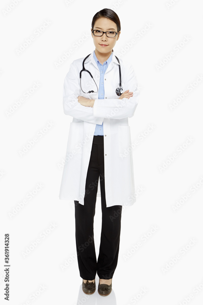 Medical personnel with arms crossed, smiling Medical personnel with arms crossed, smiling