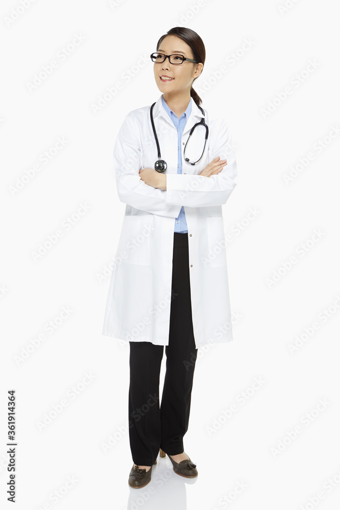 Medical personnel with arms crossed, smiling Medical personnel with arms crossed, smiling