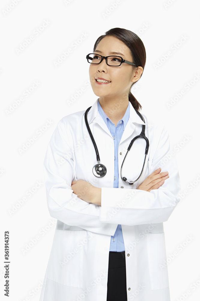 Medical personnel with arms crossed, smiling Medical personnel with arms crossed, smiling