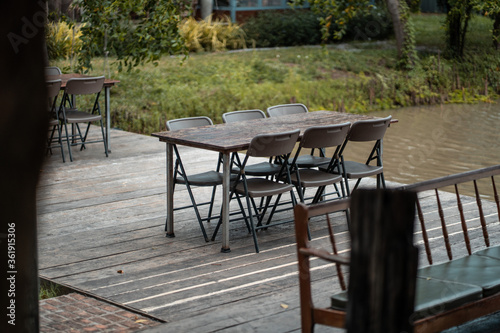 Wooden dining table by the river