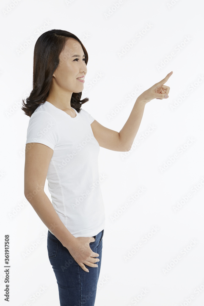Woman pointing to the left Woman pointing to the left
