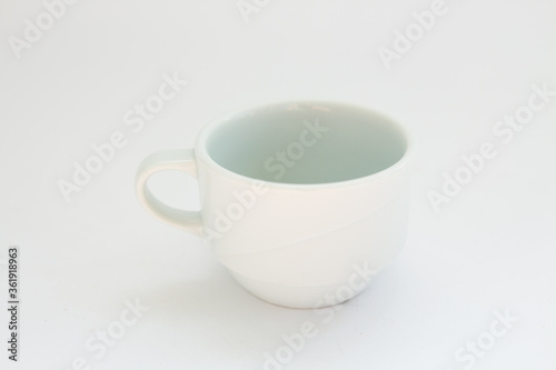 empty white coffee cup on a white background